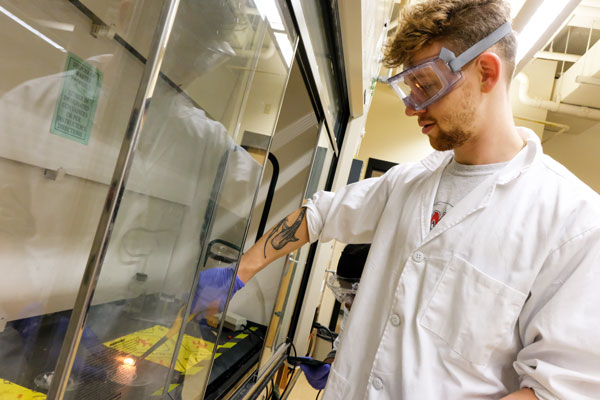 Students test the combustion of their synthesize biodiesel fuel during Bio-Organic Chemistry Lab