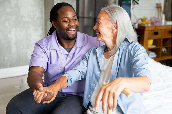 social worker with elderly patient