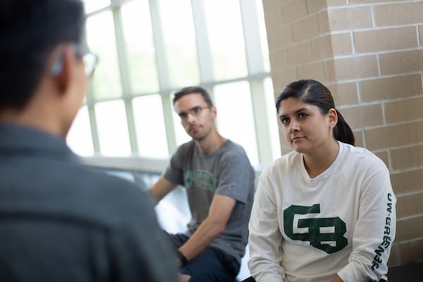 Students meet with Professor Alan Chu