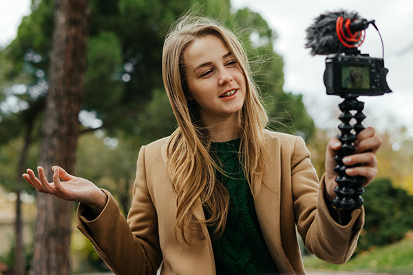 Young woman creating a vlog