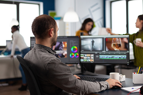 Graphic designer at desk