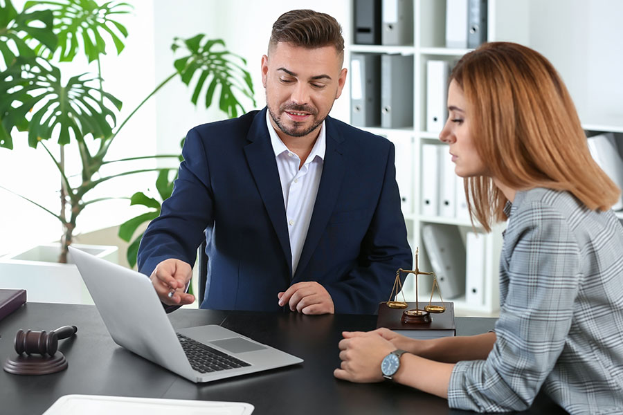 Two people meeting in lawyers office