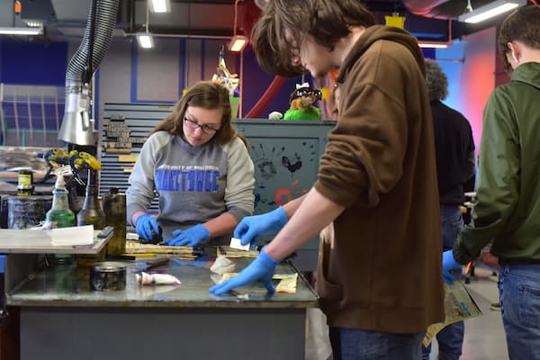 Students work in Marinette campus print studio