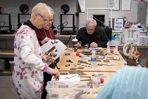 Retirees working on an art project