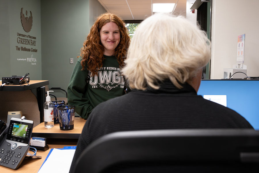 Student checking in to the wellness center