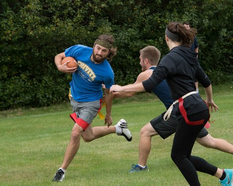 Students playing flag football