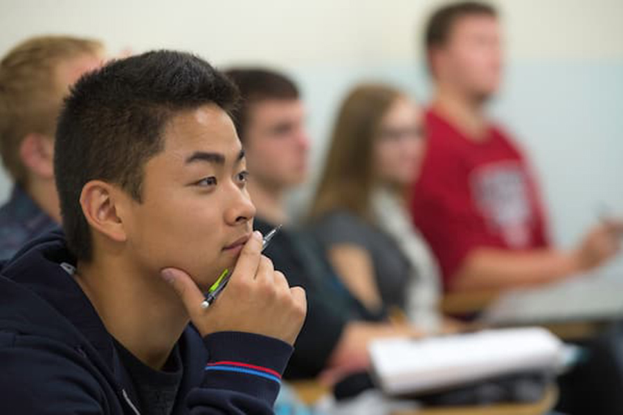 Contemplative student in class