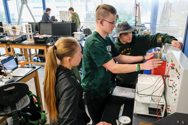 Engineering students work on project