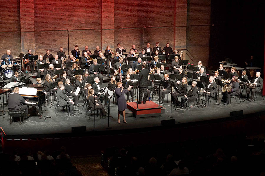 The full wind ensemble on stage