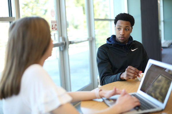 Student meeting with admission counselor