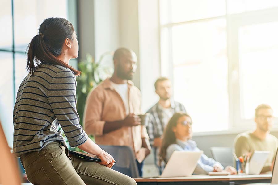 group of people listening to training