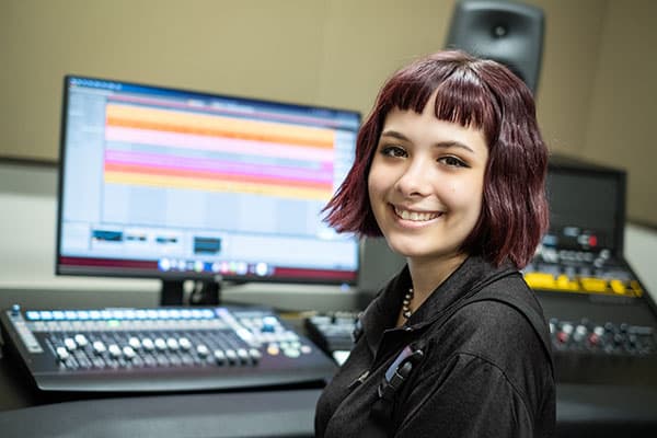 Woman at sound board