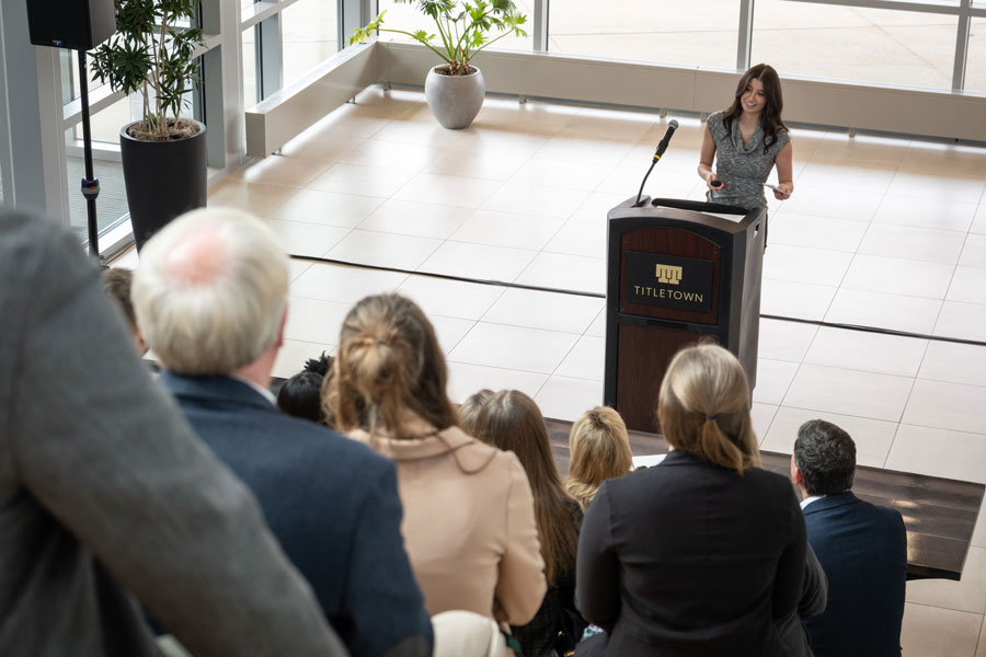 Student gives speech at business event at Titletown Tech