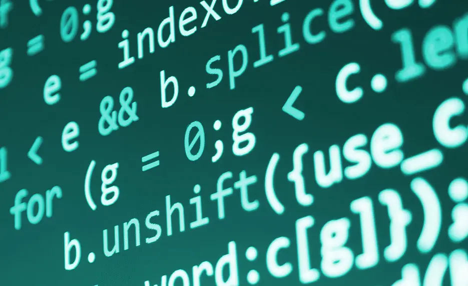 long lines of neon code on a dark background