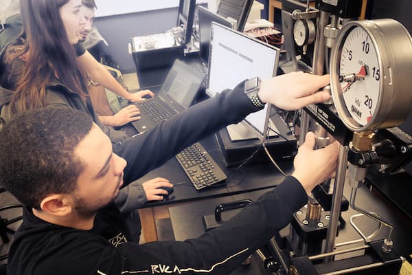 Students work in mechanical engineering lab