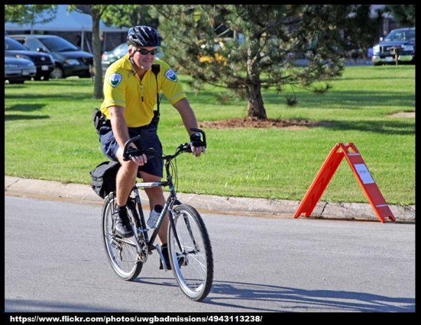 Public Safety officer riding bicycle 