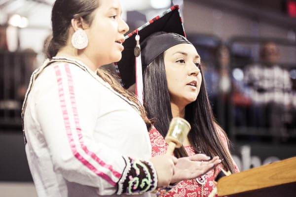 Indigenous women performing at commencement