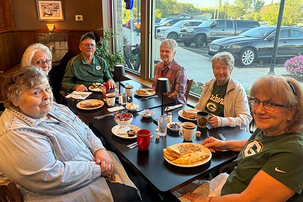 LLI group gathering for breakfast.