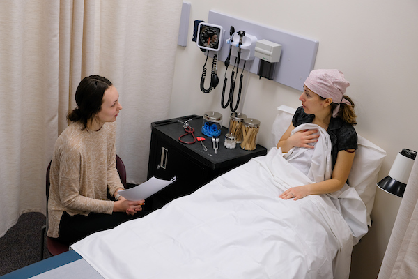 Nutrition professor Sara Wagner role playing with students