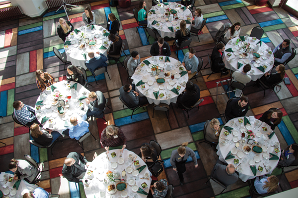 Business etiquette lunch seen from the balcony