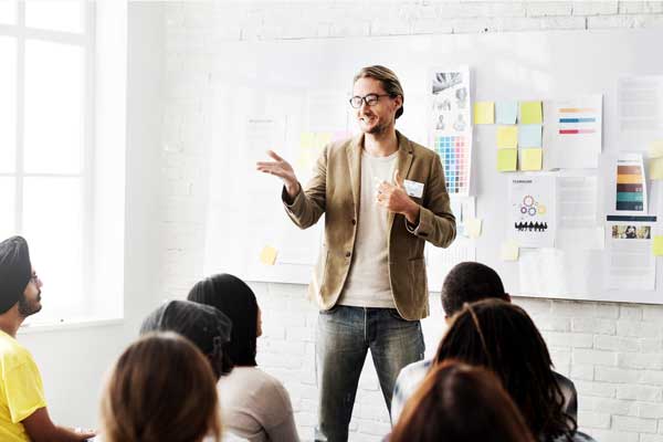 Coworkers meet for presentation