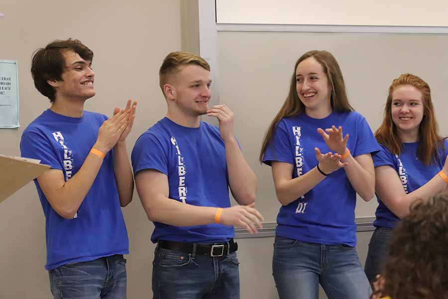 four challenge participants clapping