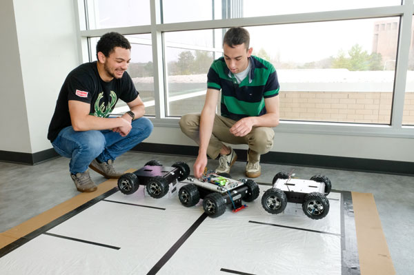 Students work on their mechatronic robotics