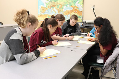 Students working together at a desk
