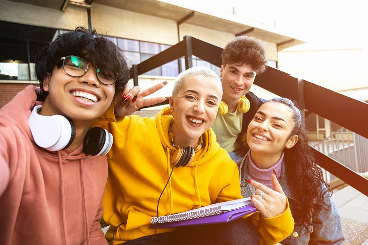 Group of students hanging out outside