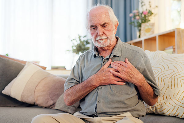Man holding chest