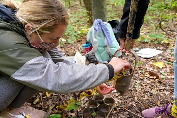 Student testing soil