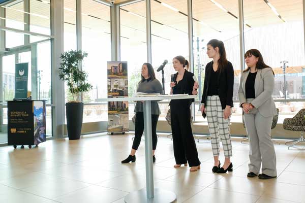 Group of female students present business pitch at Title Town Tech