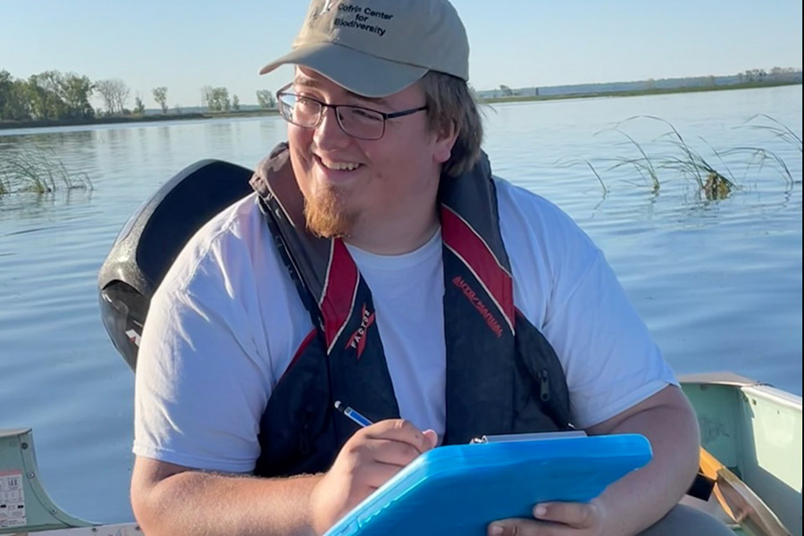 Researcher in a boat