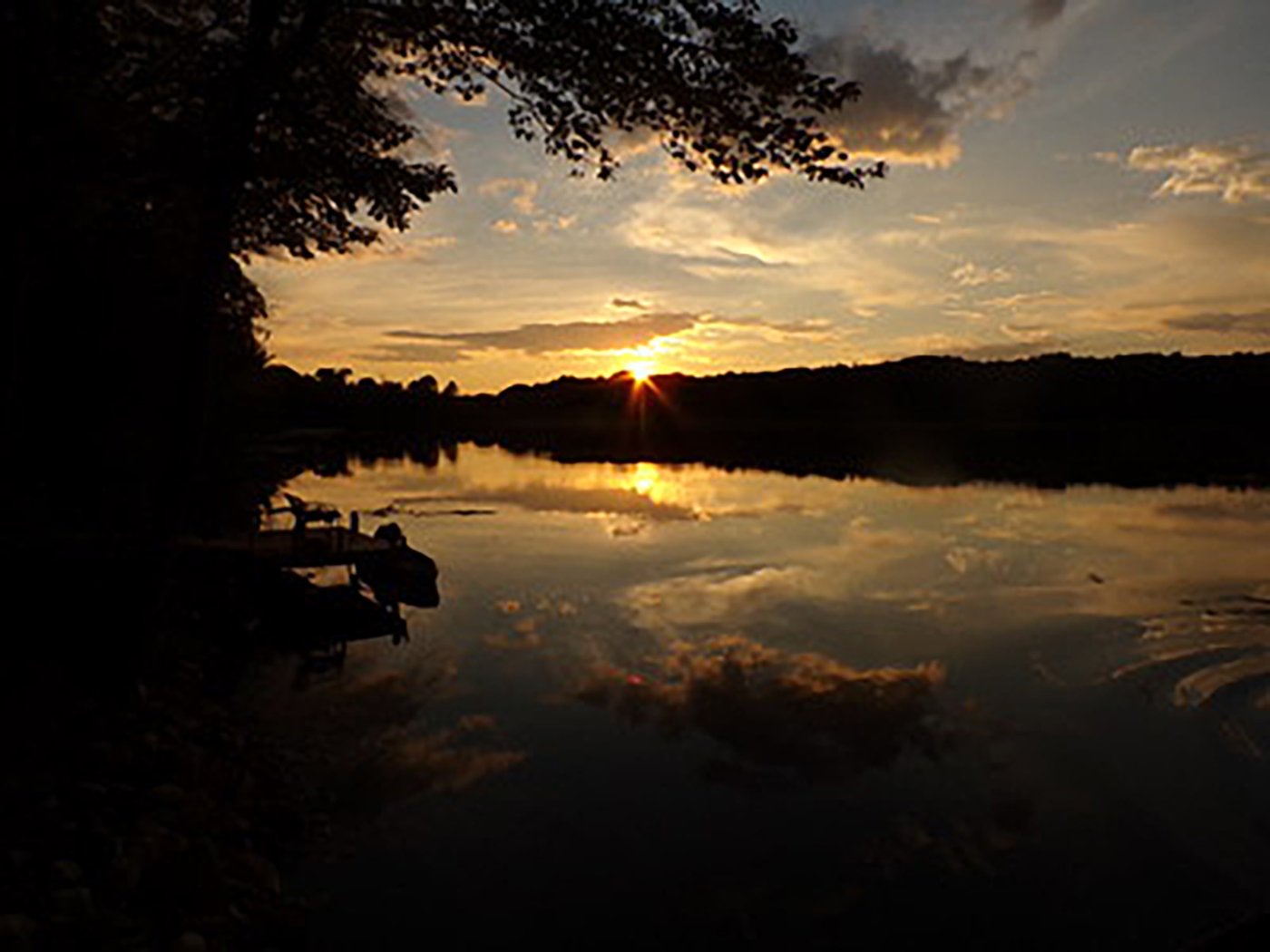 Photo of a lake at sunset/twilight.