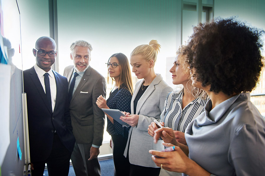 business professionals in a huddle