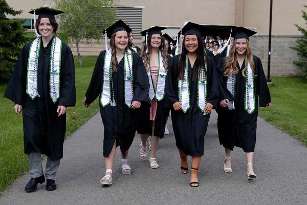 A group a Rising Phoenix graduates walking together