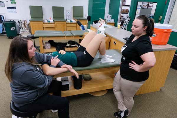 Sara Staup a student in the Master in Athletic Training Program doing her clinical experience at the UW-Green Bay Sports Medicine Athletic Training Room at the Kress Center.