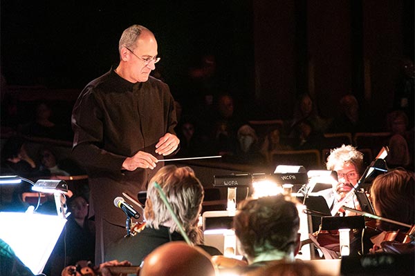 UWGB Chancellor Michael Alexander conducting the Weidner Philharmonic