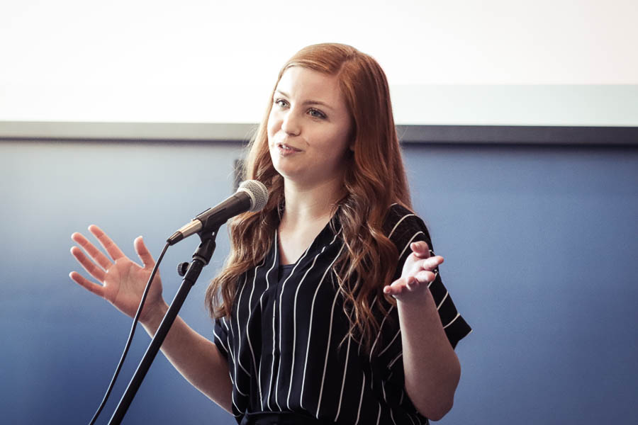 student speaking at an event