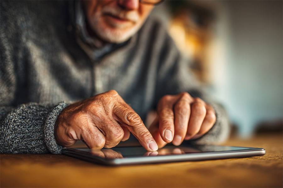 Man working on a tablet.