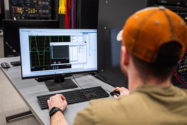 Electrical Engineering senior and Transfer student Tyler Dean works in the TEAMs Lab.
