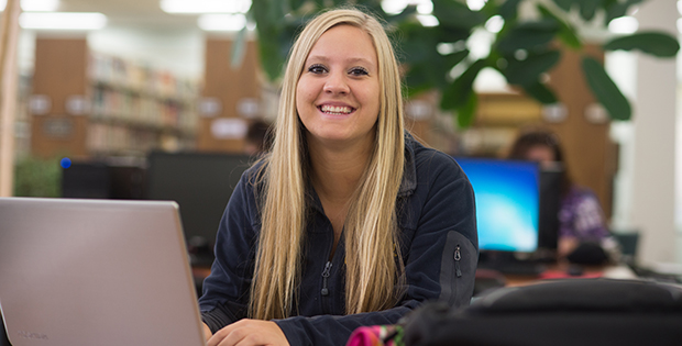 UW-Marinette student using a computer