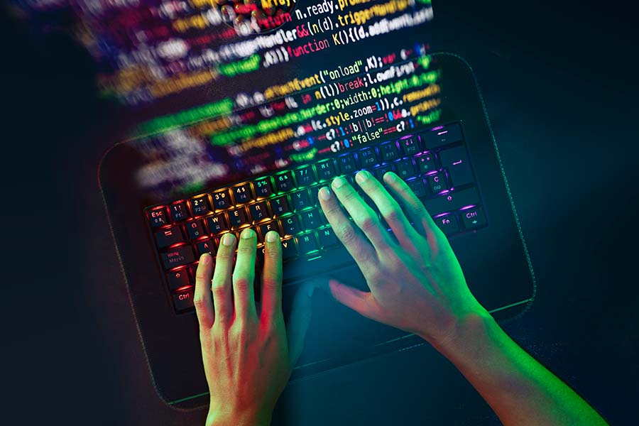 programming concept with hands on keyboard