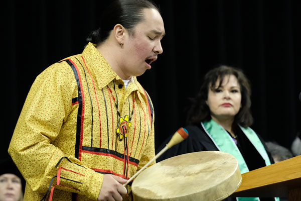 Student performing on the drum