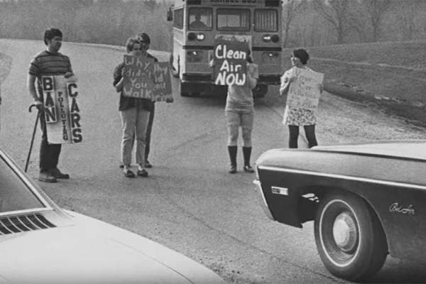 Vintage photo of UWGB students protesting automotive pollution