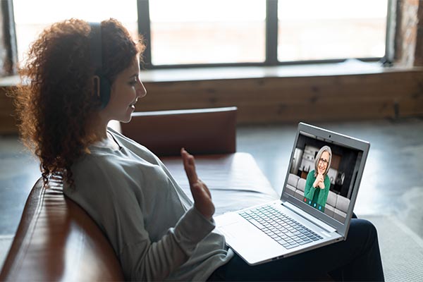 Student meeting virtually with an instructor