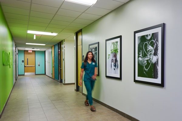 Student walking down hallway