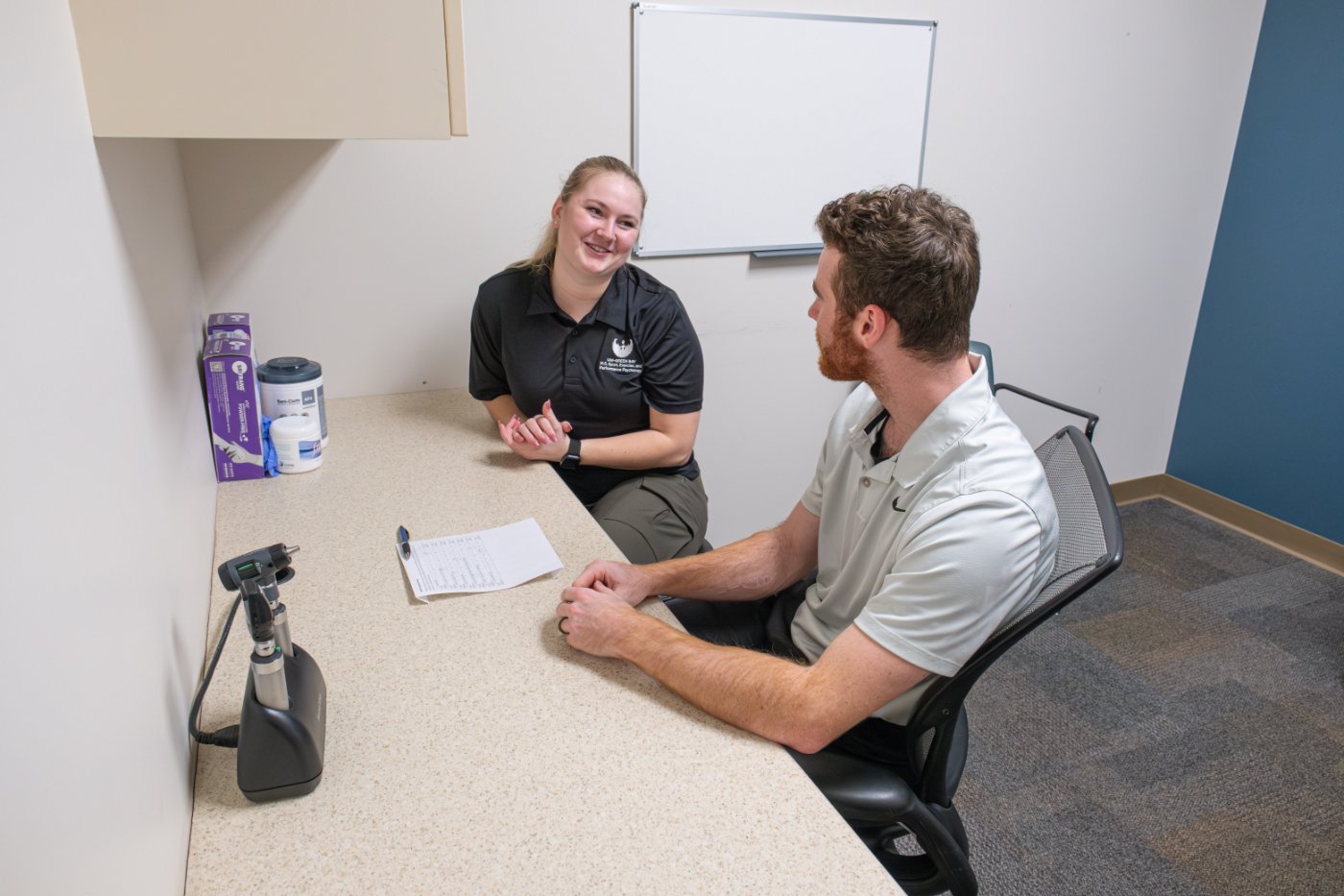 Two people at a desk