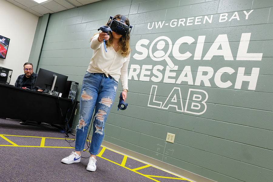 Student trying out VR in a social research lab.