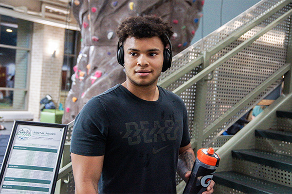 Student in the fitness center